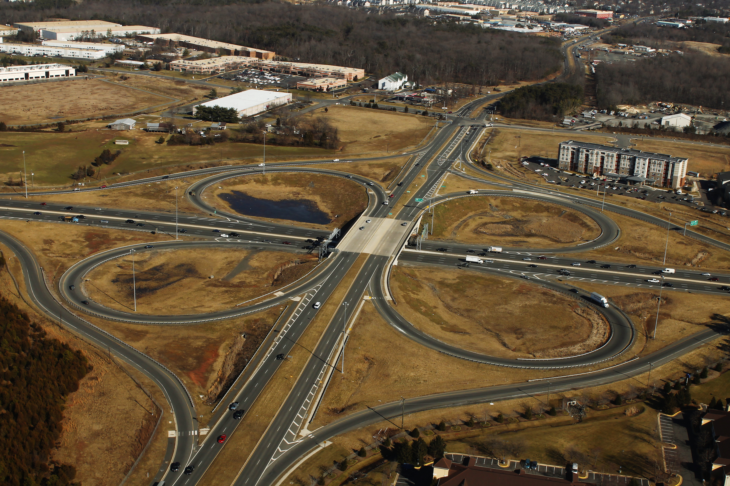 locations where examples of clover leaf interchanges are usually found